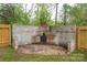 Outdoor fireplace feature with a brick surround at 601 Whisnant St, Shelby, NC 28150