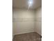 Spacious walk-in closet with wire shelving provides ample storage at 6333 Honor Ave, Midland, NC 28107