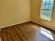 A bedroom featuring hardwood floors and natural light at 8608 Warwick Crest Ln, Charlotte, NC 28215