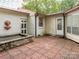 Secluded brick patio with unique water feature, perfect for outdoor relaxation and entertaining at 905 Mount Olivet Rd, Kannapolis, NC 28083