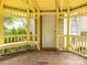 Entrance to the gazebo with a doormat that says 