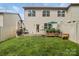 Well-maintained backyard featuring a lush lawn, patio area, and landscaping for outdoor enjoyment at 9424 Avery Lilac Ln # 83, Fort Mill, SC 29707