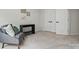 Neutral bedroom featuring a comfortable chair and a minimalist desk, perfect for relaxation and productivity at 9424 Avery Lilac Ln # 83, Fort Mill, SC 29707