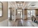 Inviting entryway with stylish light fixture, hardwood floors, and a modern white front door and decorative ceiling at Tbd Boomer Ct # 7, Statesville, NC 28677