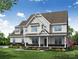 Beautiful two-story home featuring white siding, covered porch, meticulous landscaping, and a well-manicured lawn at Tbd Boomer Ct # 7, Statesville, NC 28677