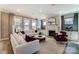 Cozy living room with fireplace, bright windows, and comfortable seating, creating an inviting atmosphere at Tbd Boomer Ct # 7, Statesville, NC 28677