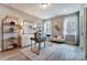 Bright home office with plenty of natural light, built-in shelving, and a comfortable workspace at Tbd Boomer Ct # 7, Statesville, NC 28677