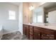 Bathroom features double sink vanity with modern fixtures and a separate shower at 1030 Gardenia Dr # 2, Mt Ulla, NC 28125