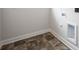 Small laundry room with tile floors and plenty of space for washer and dryer at 1030 Gardenia Dr # 2, Mt Ulla, NC 28125