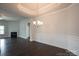 Living room with hardwood floors, fireplace, and tray ceiling at 1030 Gardenia Dr # 2, Mt Ulla, NC 28125