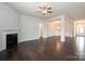 Bright living room featuring dark hardwood floors, fireplace, and plenty of space for entertaining at 1030 Gardenia Dr # 2, Mt Ulla, NC 28125