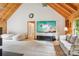 Bright and airy living room with high ceilings, modern furniture, and a large screen TV at 10583 Earnhardt Lake Rd, Davidson, NC 28036