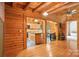 Open floorplan showcasing the kitchen, dining area, and living room with natural wood finishes at 10583 Earnhardt Lake Rd, Davidson, NC 28036