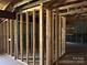 Basement with wood framing for future walls at 10625 Cool Springs Rd, Woodleaf, NC 27054