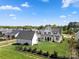 Stunning aerial view of the home, showcasing the backyard, patio, and surrounding neighborhood at 11015 Benjamin Smith Ave, Huntersville, NC 28078