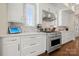 Gourmet kitchen featuring stainless steel appliances and quartz countertops at 11015 Benjamin Smith Ave, Huntersville, NC 28078
