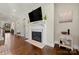 Inviting living room features a fireplace, hardwood floors, and neutral paint at 11015 Benjamin Smith Ave, Huntersville, NC 28078