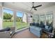 Relaxing covered patio with outdoor seating, a fire pit, and a view of the backyard at 11015 Benjamin Smith Ave, Huntersville, NC 28078