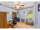 Functional office or bedroom with natural light, ample storage, and neutral décor at 130 Overcreek Rd, Mooresville, NC 28117