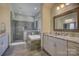 Spa-like bathroom with a soaking tub, walk-in shower, double vanity and granite countertops at 1306 Kings Bottom Dr, Fort Mill, SC 29715