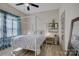 Cozy bedroom featuring a four-poster bed, neutral decor, and a serene ambiance at 1306 Kings Bottom Dr, Fort Mill, SC 29715