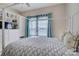 Comfortable bedroom featuring soft natural light, a four-poster bed, and tranquil decor at 1306 Kings Bottom Dr, Fort Mill, SC 29715