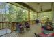 Expansive wooden deck featuring comfortable seating, a grill, and a telescope, ideal for outdoor relaxation and entertainment at 1306 Kings Bottom Dr, Fort Mill, SC 29715