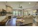 Spacious open living room flows seamlessly to the dining area, featuring large windows and hardwood floors at 1306 Kings Bottom Dr, Fort Mill, SC 29715