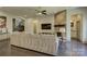Spacious living room featuring hardwood floors, a fireplace, and seamless flow to the dining and staircase at 1306 Kings Bottom Dr, Fort Mill, SC 29715