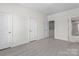 Spacious bedroom featuring plush carpet and ample natural light at 133 Capital Ave # B, Mooresville, NC 28117