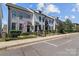 Charming townhomes featuring well-maintained landscaping and inviting exteriors at 133 Capital Ave # B, Mooresville, NC 28117