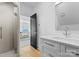 Modern bathroom featuring a glass-enclosed shower and a bright vanity at 1446 Townes Rd, Charlotte, NC 28209