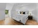 Bright bedroom with angled ceilings, wood floors, and neutral decor at 1446 Townes Rd, Charlotte, NC 28209
