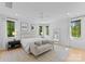 Serene main bedroom boasts natural light and hardwood floors at 1446 Townes Rd, Charlotte, NC 28209