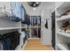 Well-organized walk-in closet with ample storage and custom shelving at 1446 Townes Rd, Charlotte, NC 28209