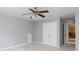 Bedroom featuring a closet with double doors and access to the living area at 1540 Coatsworth Ln, Rock Hill, SC 29732