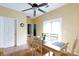 Bright dining area with natural light, wood floors, and a simple table setting at 1540 Coatsworth Ln, Rock Hill, SC 29732
