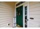 View of front door with welcome sign and wreath, creating a warm ambiance at 1540 Coatsworth Ln, Rock Hill, SC 29732