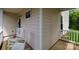 View of a front porch with rocking chairs, offering a cozy welcome at 1540 Coatsworth Ln, Rock Hill, SC 29732