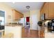 Functional kitchen featuring light wood cabinets, laminate countertops, and a breakfast bar area at 1540 Coatsworth Ln, Rock Hill, SC 29732