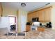 Efficient kitchen with stainless steel appliances, light wood cabinets, and durable laminate countertops at 1540 Coatsworth Ln, Rock Hill, SC 29732