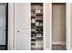 Linen closet with shelves for towels and storage between two doors at 17315 Langston Dr, Charlotte, NC 28278
