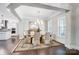 Elegant dining room with stylish lighting, a large mirror, and a view of the kitchen at 17315 Langston Dr, Charlotte, NC 28278