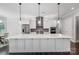 Modern kitchen with a large island, stainless steel appliances, and pendant lighting at 17315 Langston Dr, Charlotte, NC 28278