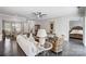 Bright and airy living room with hardwood floors leading into the dining area at 17315 Langston Dr, Charlotte, NC 28278