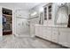Bathroom featuring dual vanities, a glass-enclosed shower, and ample storage at 17315 Langston Dr, Charlotte, NC 28278