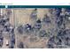 Aerial view showcasing a property with mature trees and an expansive lot, awaiting a vision for new development at 191 S Main St, Richburg, SC 29729