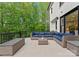 Beautiful deck featuring lounge area, outdoor seating, and lush backyard views at 200 Royalton Pl, Huntersville, NC 28078