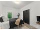 Cozy bedroom with plush rug, neutral walls, and ample natural light at 200 Royalton Pl, Huntersville, NC 28078