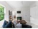 Cozy bedroom setup with large window and ladder shelf at 200 Royalton Pl, Huntersville, NC 28078